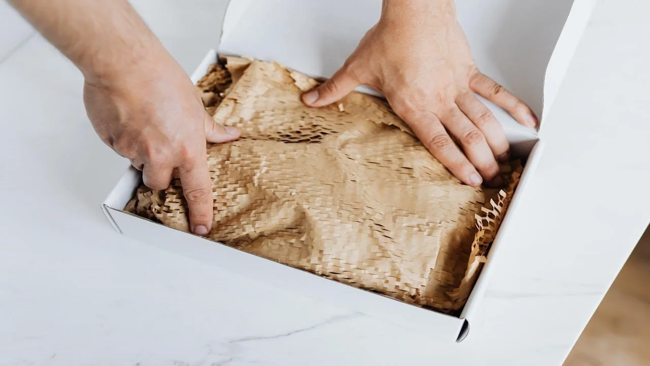 A man preparing a package